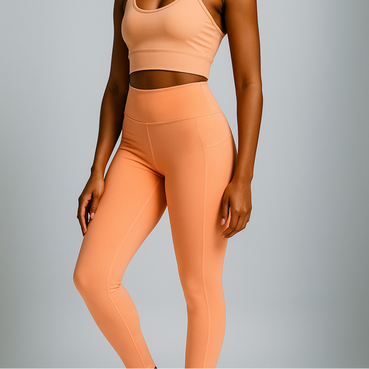 woman wearing orange Peach seamless high-waisted leggings with hip pockets, IHAMORA activewear XS–XL