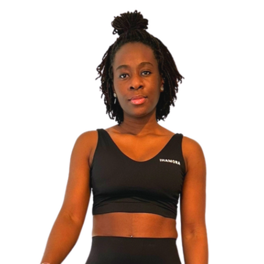 Woman wearing Black V-neck sports bra, IHAMORA activewear.