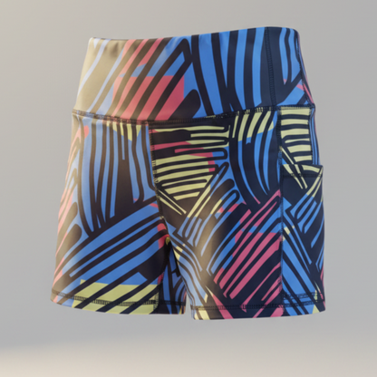Colorful swim shorts with abstract pattern on a gray background