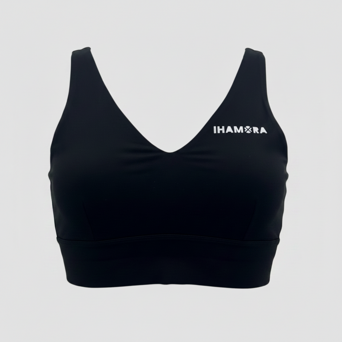 Black sports bra with 'IHAMORA' logo on a light gray background