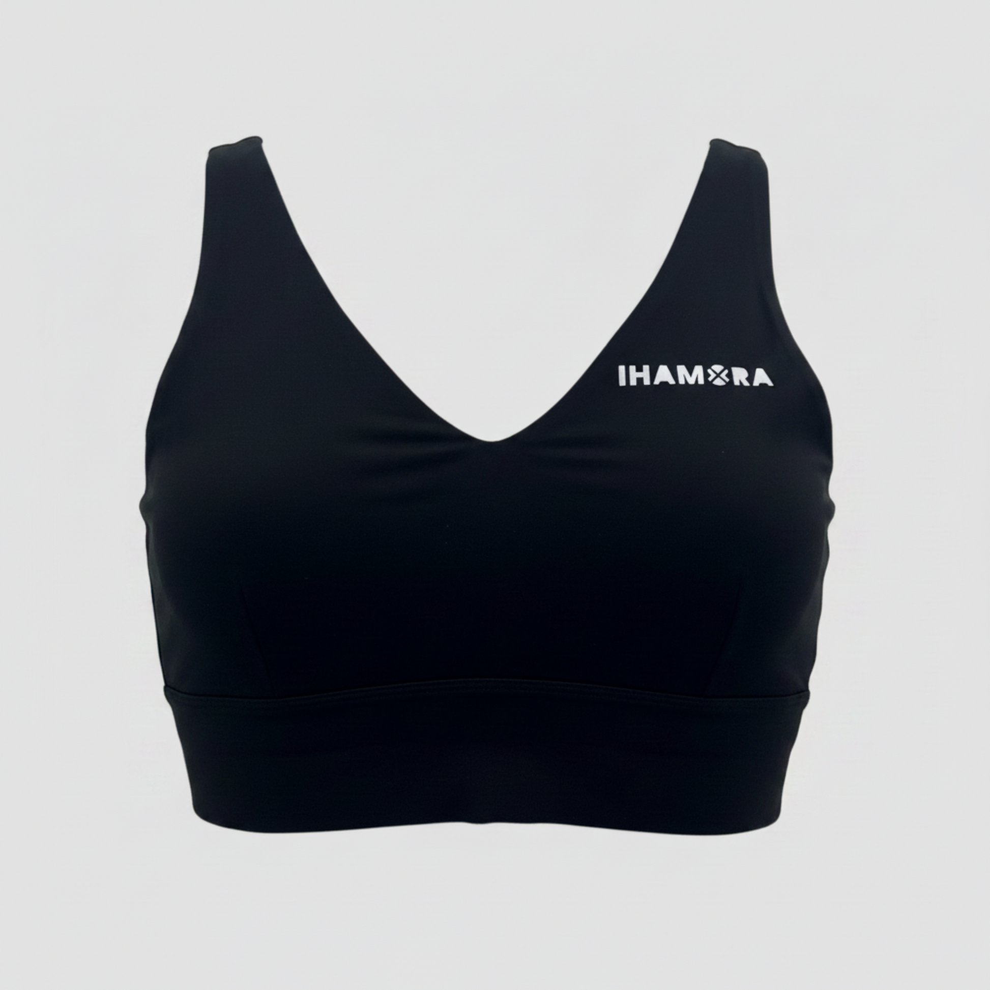 Black sports bra with 'IHAMORA' logo on a light gray background