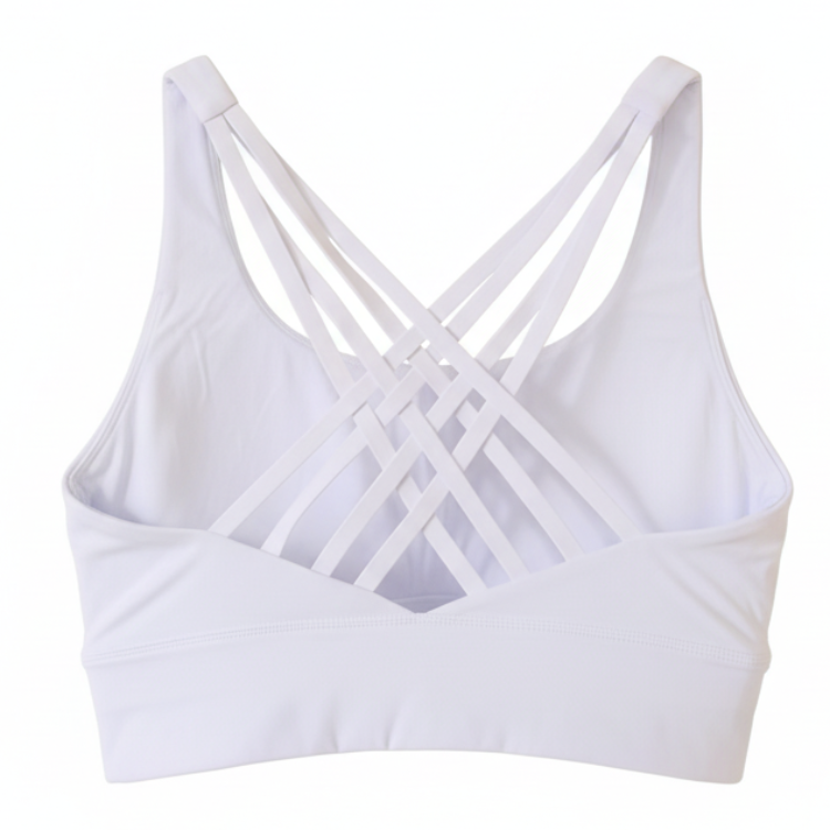 White sports bra with criss-cross straps on a white background