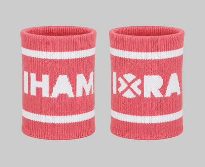 Two pink wristbands with white text and stripes on a white background