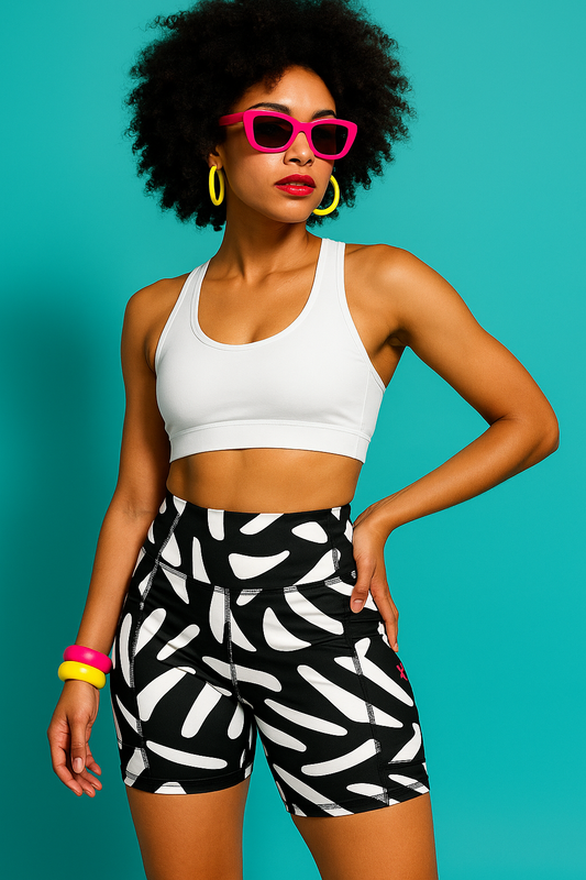 woman wearing Swirl black and white high-waisted shorts with pockets, IHAMORA women’s activewear