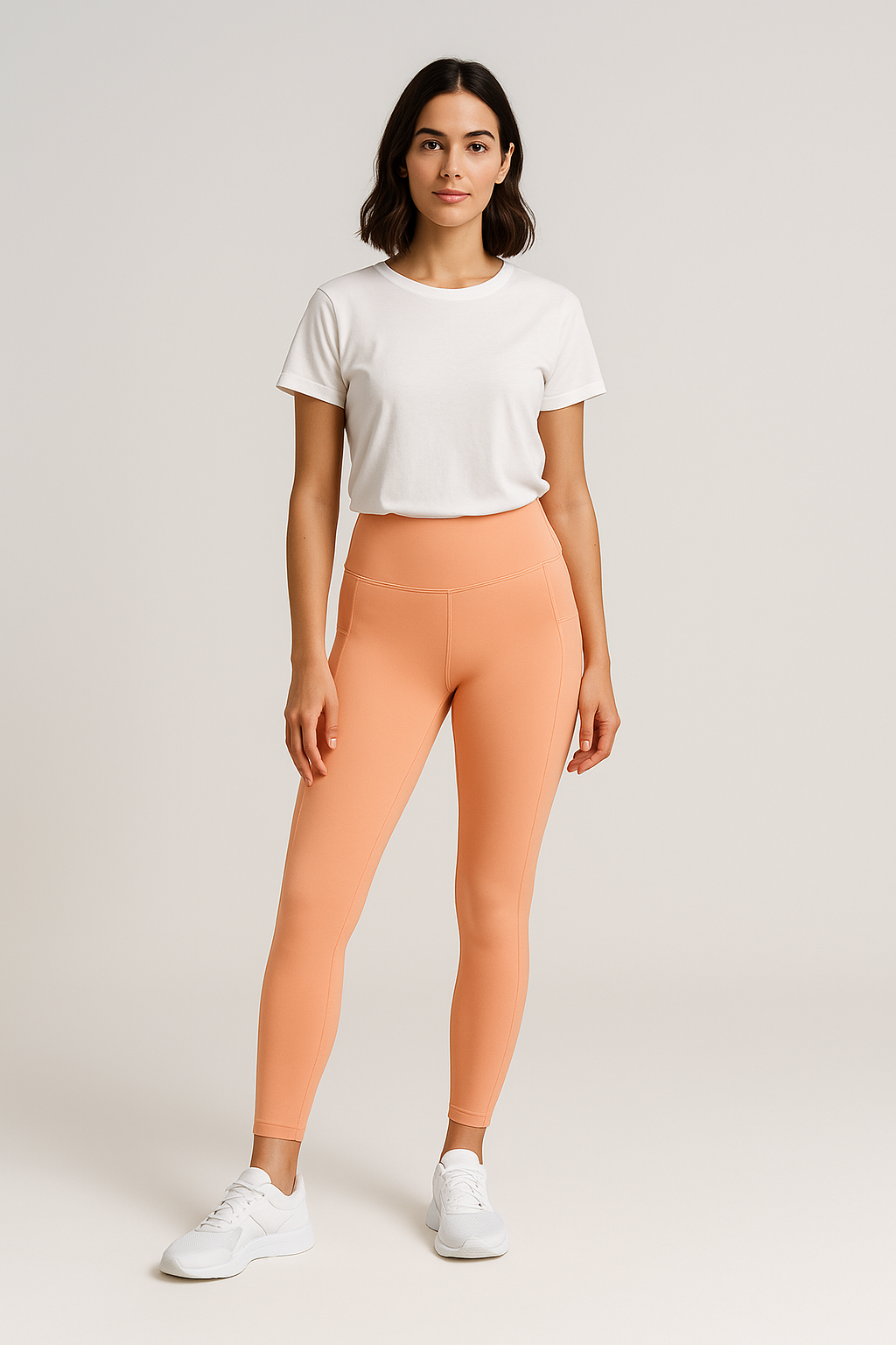 woman wearing orange Peach seamless high-waisted leggings with hip pockets, IHAMORA activewear XS–XL