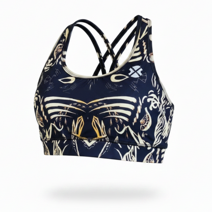 Navy sports bra with white and gold abstract pattern on a white background