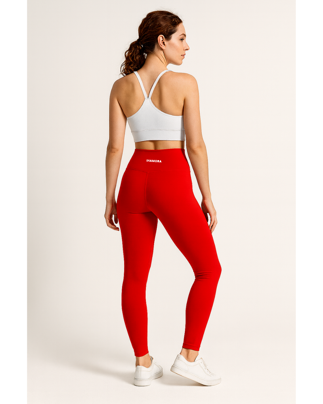 woman wearing Scarlet seamless red high-waisted leggings with visible side pockets, IHAMORA women’s activewear XS–XL