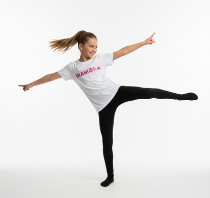 Dancer in a white t-shirt with 'IHAMORA' logo, black leggings on a white background
