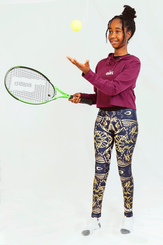 Girl wearing IHAMORA The Head signature print leggings, high-waisted seamless fit.