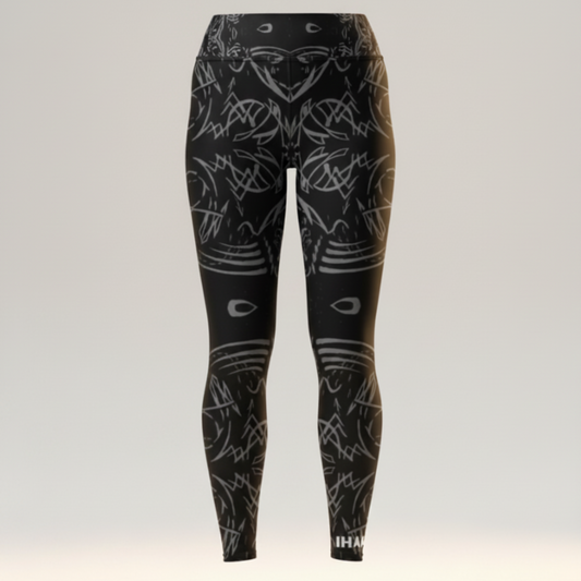 Black leggings with white abstract patterns on a light gray background